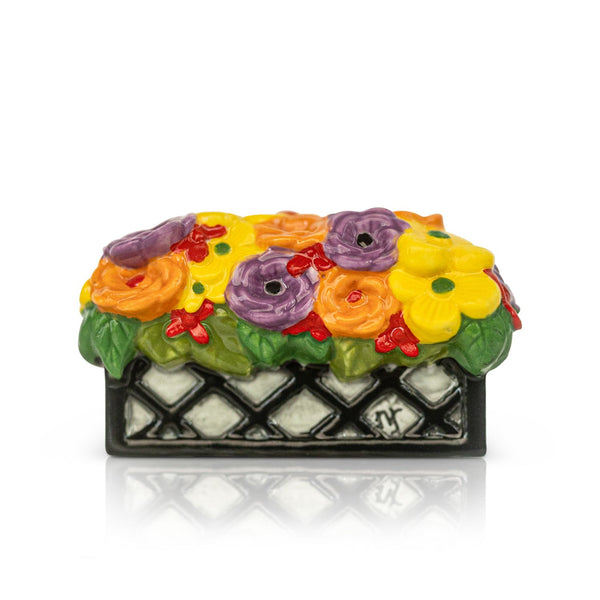 flower box mini with bright purple, orange and yellow flowers