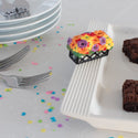 flower box mini on a melamine try with brownies