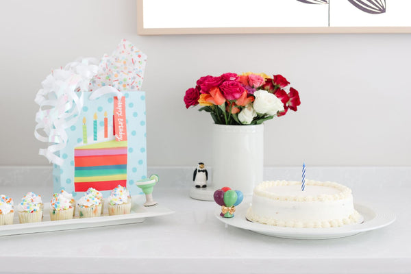 penguin mini on a cutie container, margarita on a cracker tray and balloon mini on a round platter