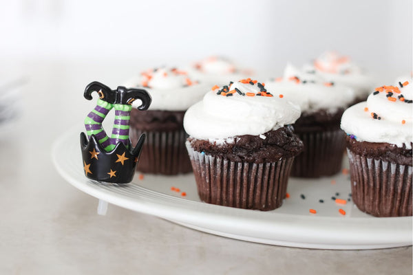 witches feet mini with halloween cupcakes on a round platter
