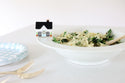 home sweet, home mini on pinstripes bowl with a bowl of pasta