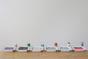 robin's egg nest mini and various minis on napkink holders with our nora fleming napkins