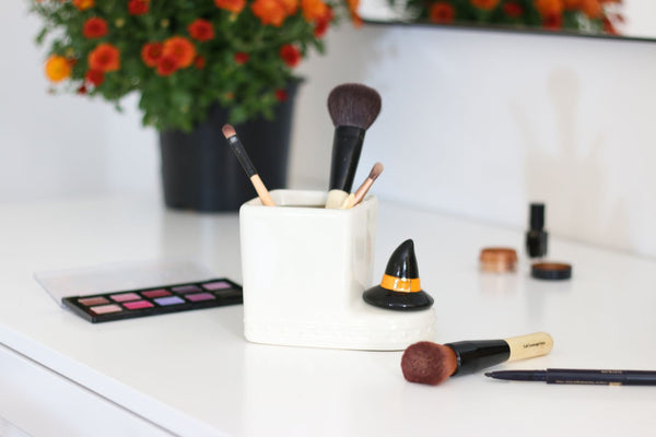 witch hat mini on cutie container with makeup brushes