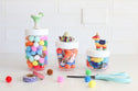 lime and salt margarita mini, sombrero mini and pinata mini all on melamine containers filled with craft supplies