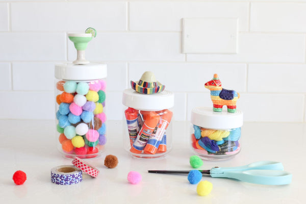 lime and salt margarita mini, sombrero mini and pinata mini all on melamine containers filled with craft supplies