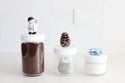 pinecone mini on medium canister and snowman mini on large container and snowflake mini on small container