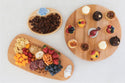 wood boards and snowflake mini, polar bear mini and cardinal mini filled with assorted food