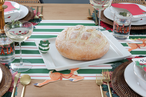 green and white ornament and christmas table setting