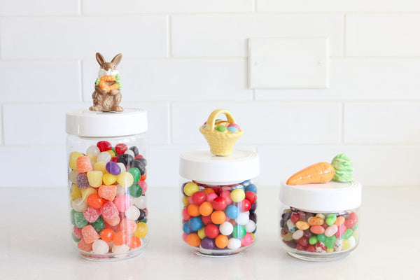 candy containers and bunny with carrots and easter basket and carrots