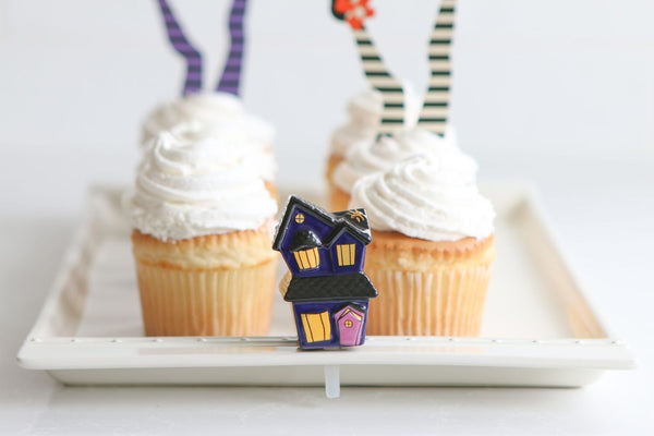 haunted house mini on tray with cupcakes