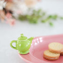 Fiesta Dinnerware teapot and pink platter