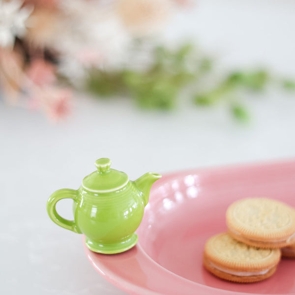 Fiesta Dinnerware teapot and pink platter