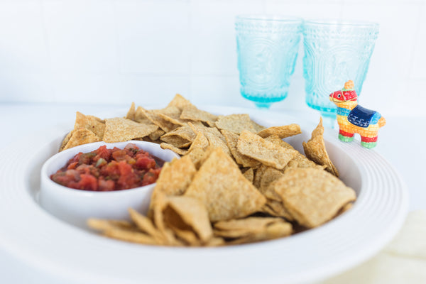 chip and dip platter with cinco de mayo mini and tortilla chips and salsa