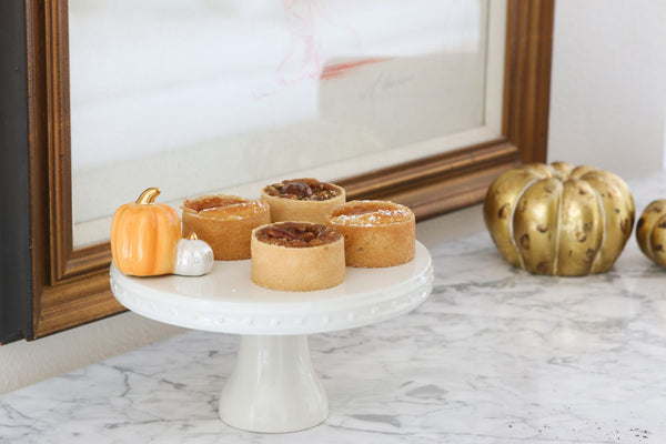 pumpkin spice mini on a cake stand