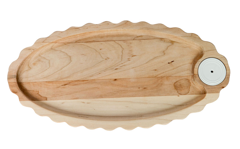 A wooden, oval-shaped, scalloped edge serving tray with a decorative hole in one corner, displaying a natural wood pattern.