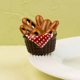 bread basket mini on a white platter and green background