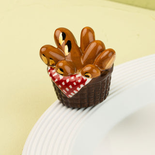 bread basket mini on a white platter and green background