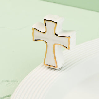 Cross-shaped mini on a light green background