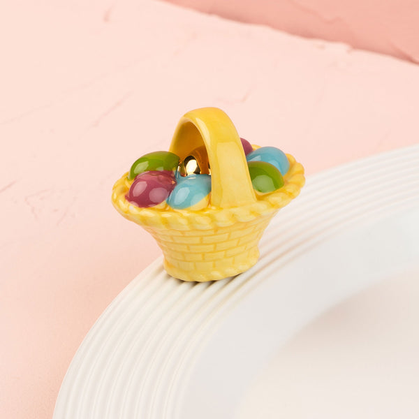 easter basket mini on a white platter and pink background