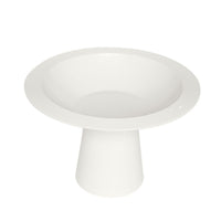 White ceramic cake stand on a white background