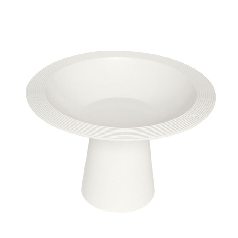 White ceramic cake stand on a white background