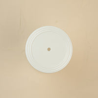 top view of a pinstripes melamine lid with a glass large canister