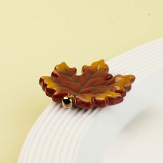 leaf-shaped mini a white plate with a light green background