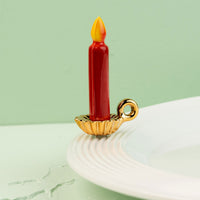candle mini on a white platter with a light green background