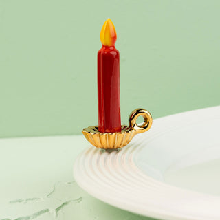 candle mini on a white platter with a light green background