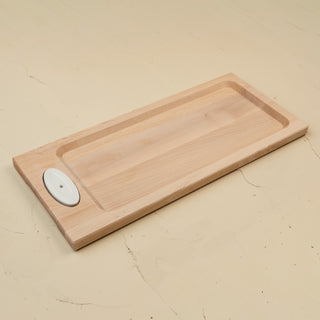 This image features a handcrafted maple bread board designed by J.K. Adams