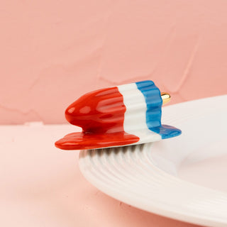 popsicle mini on a white platter and pink background