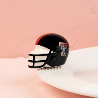texas tech football helmet mini with red and white accents on a pink background
