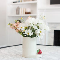 strawberry mini on flower container