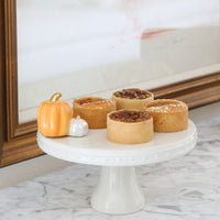 pumpkin spice mini on a cake stand